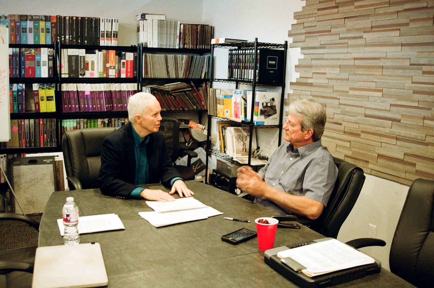 Jerry Llewellyn leading a candid culture conversation with a client in a conference room